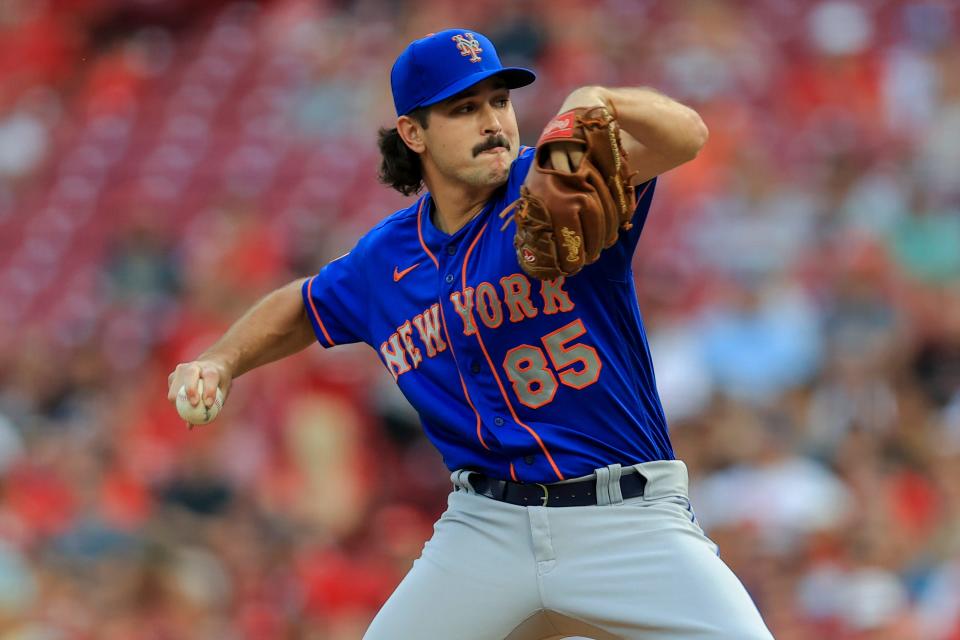 New York Mets' Stephen Nogosek throws during a baseball game against the Cincinnati Reds in Cincinnati, Tuesday, July 20, 2021. The Reds won 4-3.