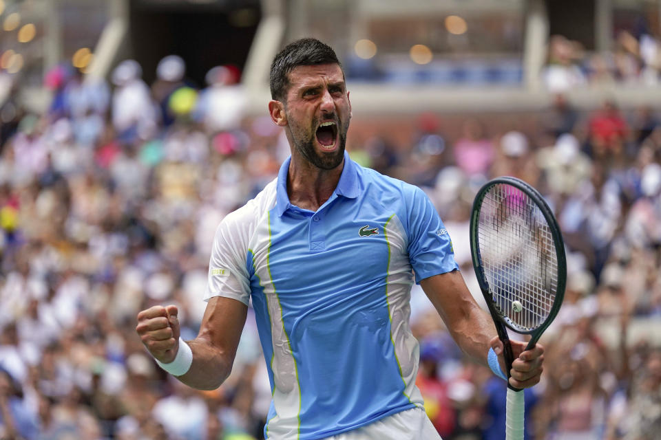 Novak Djokovic, of Serbia, reacts after defeating Taylor Fritz, of the United States, in the quarterfinals of the U.S. Open tennis championships, Tuesday, Sept. 5, 2023, in New York. (AP Photo/Seth Wenig)