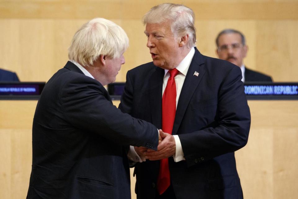 Boris Johnson and Donald Trump shake hands as world leaders gathered for a UN summit (AP)