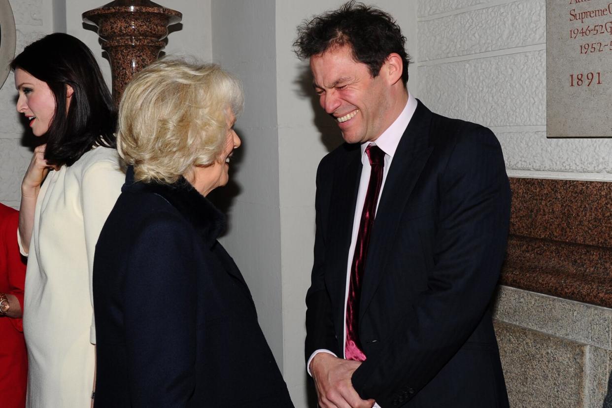 Dominic West and Camilla, Duchess of Cornwall attend the Maggie's Christmas Carol concert at St Paul's Cathedral