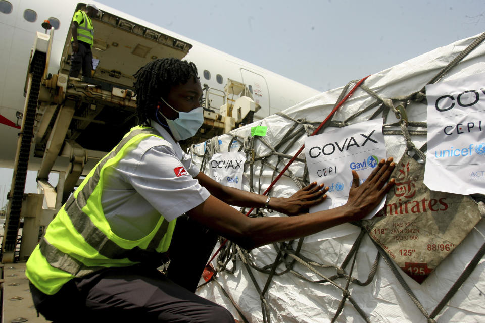 FILE - In this Feb. 25, 2021, file photo, a shipment of COVID-19 vaccines distributed by the COVAX global initiative arrives in Abidjan, Ivory Coast. As many as 60 countries, including some of the poorest, might be stalled at the first shots of their coronavirus vaccinations because nearly all deliveries through the program intended to help them are being blocked until as late as June. (AP Photo/Diomande Ble Blonde, File)