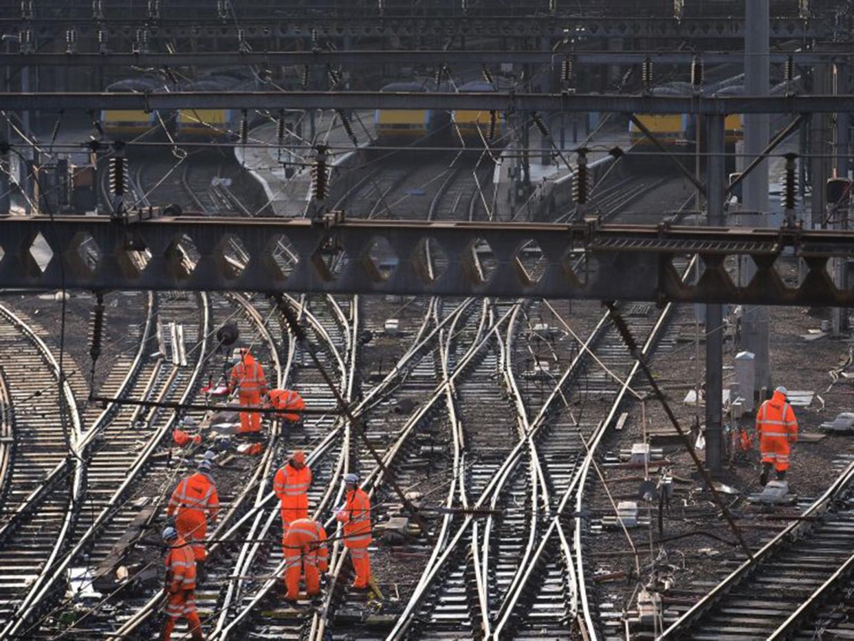 Network Rail looks after 20,000 miles of track and has debts of close to £40bn: PA