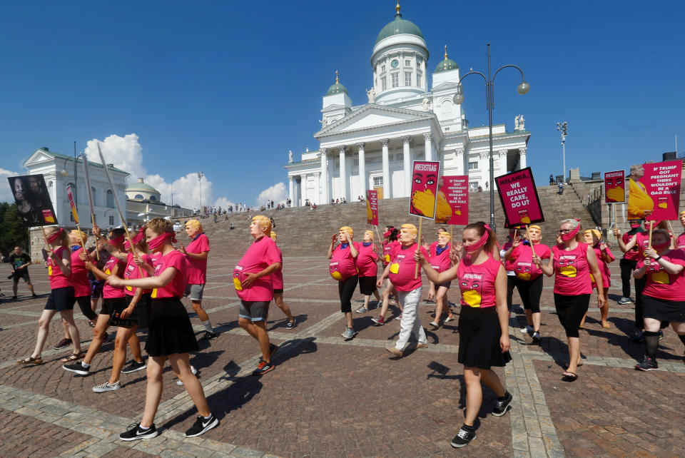 Activists launch protests ahead of the Helsinki summit (Reuters)