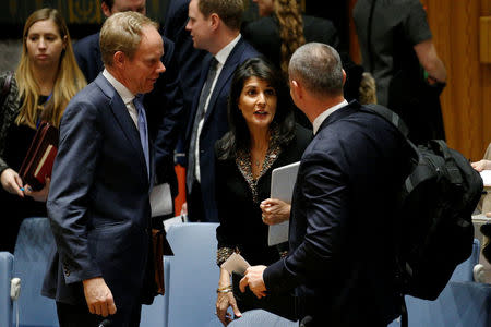 U.S. Ambassador to the United Nations Nikki Haley speaks with Nickolay Mladenov (R), the United Nations' Special Coordinator for the Middle East Peace Process and British Ambassador to the U.N. Matthew Rycroft (L) following a United Nations Security Council meeting on the situation in the Middle East, including Palestine, at U.N. Headquarters in New York City, New York, U.S., December 18, 2017. REUTERS/Brendan McDermid