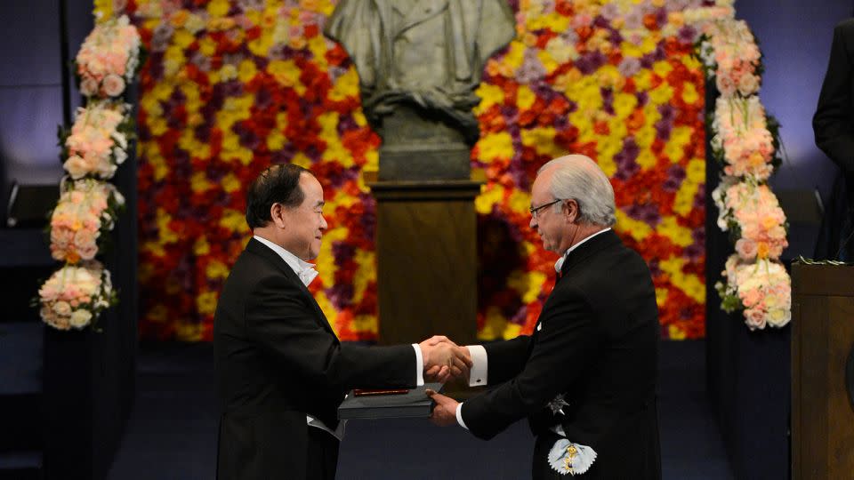 Mo Yan receives the 2012 Nobel Literature Prize from King Carl Gustaf of Sweden during an award ceremony on December 10, 2012 in Stockholm. - Jonathan Nackstrand/AFP/Getty Images