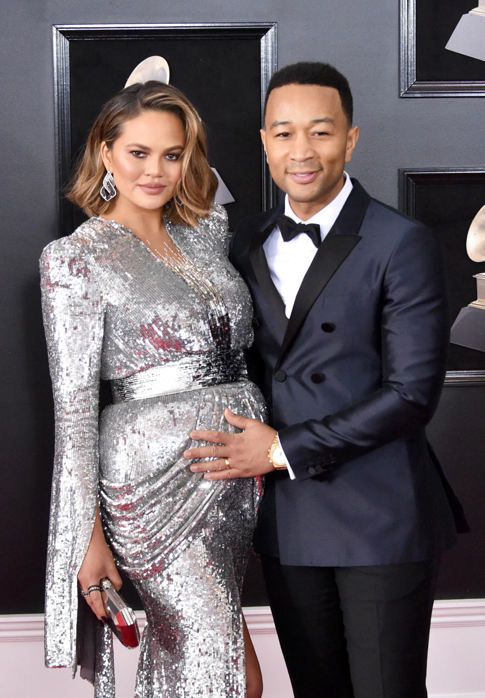 Chrissy Teigen and John Legend at the Grammy Awards Sunday night. (Photo: Getty Images)