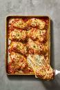 <p>With zero deep frying required, this pan of cheesy goodness is perfect for busy weeknights. </p><p>Get the <strong><a href="https://www.goodhousekeeping.com/food-recipes/a38867676/sheet-pan-chicken-parmesan-recipe/" rel="nofollow noopener" target="_blank" data-ylk="slk:Sheet Pan Chicken Parmesan recipe;elm:context_link;itc:0;sec:content-canvas" class="link ">Sheet Pan Chicken Parmesan recipe</a></strong>. </p>