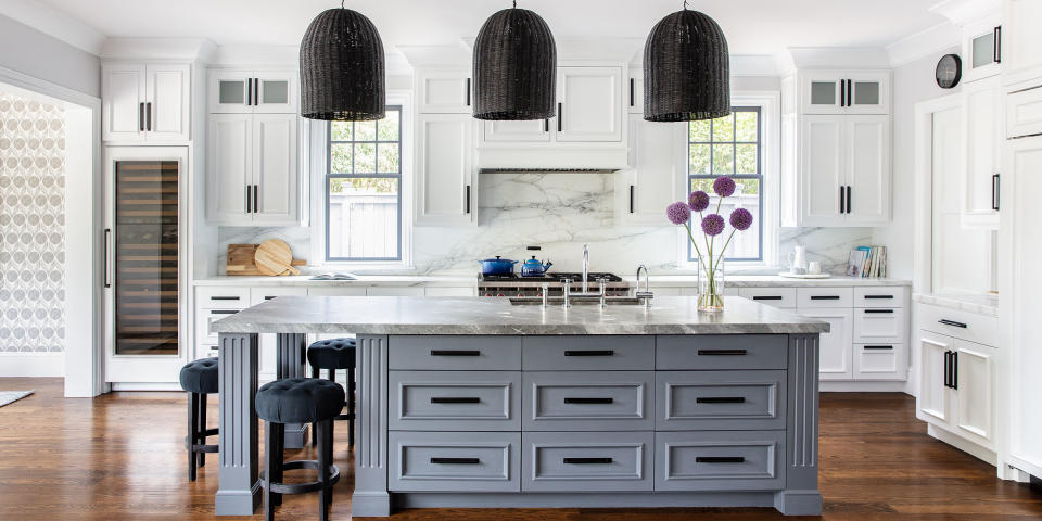 Adding a pop of color, even if it's just on an island, can give your kitchen some personality. (Thomas Kuoh)