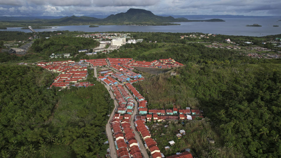 A relocation site for victims of super Typhoon Haiyan is seen in Tacloban, central Philippines on Sunday Oct. 23, 2022. About 40% of the population of Tacloban were relocated to safer areas after super Typhoon Haiyan wiped out most of the villages, killing thousands when it hit central Philippines in 2013. (AP Photo/Aaron Favila)