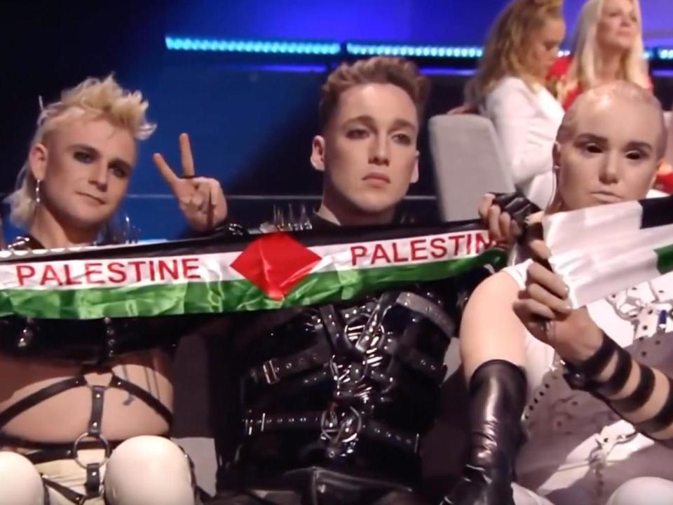 Iceland’s Eurovision act could face punishment after displaying Palestinian flags during Saturday night’s live television broadcast, organisers said.Leather-clad bondage punk trio Hatari held up banners bearing the word “Palestine” and the colours of the flag while their vote was announced, before cameras cut back to hosts Bar Refaeli and Ezra Tel.Band member Stefán Ágústsson later shared video on Twitter showing security officials demanding the group hand over the flags following the protest.Hatari had been critical of Israel before the grand finale, even challenging the country’s prime minister Benjamin Netanyahu to a “friendly match of traditional Icelandic trouser grip wrestling”.In a statement, Eurovision organisers said the “consequences of this action” would be discussed by the contest’s executive board. “The Eurovision Song Contest is a non-political event and this directly contradicts the contest rule,” they stated.Organisers added: “The banners were quickly removed and the consequences of this action will be discussed by the reference group [the contest’s executive board] after the contest.”Hatari’s gesture did not impress the Palestinian Campaign For The Academic And Cultural Boycott Of Israel (PACBI), which had demanded all acts pull out of the event.In a statement, PACBI said: “Palestinian civil society overwhelmingly rejects fig-leaf gestures of solidarity from international artists crossing our peaceful picket line.”> "Give me palestine flag" so we can pretend they dont exist. HATARI 12stig Eurovision pic.twitter.com/szBh0PdfiI> > — Stefán Ágústsson (@stebbisnaer) > > May 18, 2019Although the annual song contest is supposed to be “non-political”, this year’s build-up was marred by controversy and calls for a boycott by pro-Palestinian activists.Madonna’s performance saw her backing dancers display both Israeli and Palestinian flags on their backs.“This element of the performance was not part of the rehearsals which had been cleared,” said competition organisers. “The Eurovision Song Contest is a non-political event and Madonna had been made aware of this.”The star had earlier defied calls from pro-Palestinian activists to cancel the show, saying beforehand that she wanted to create “a new path toward peace”.Small pro-Palestinian protests were held outside the Expo centre in Tel Aviv, while in Jerusalem, clashes broke out between the security forces and Ultraorthodox Jews protesting against Eurovision’s desecration of the Sabbath.