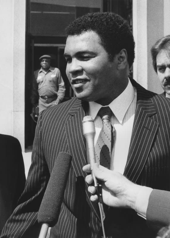 Muhammad Ali speaks with reporters in Washington D.C., on May 5, 1986. On April 30, 1967, Ali was stripped of his world heavyweight boxing championship title after he refused to be drafted into the U.S. military. File Photo by Leighton Mark/UPI