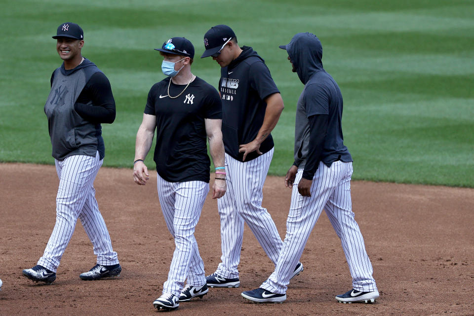 Clint Frazier sports his mask during a Yankees workout. (Photo by Elsa/Getty Images)