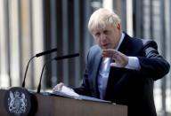 Britain's new Prime Minister, Boris Johnson, delivers a speech outside Downing Street, in London