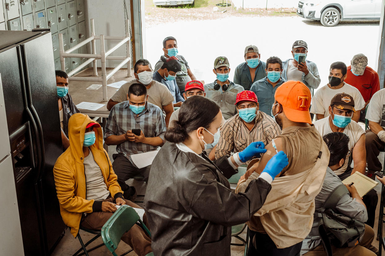 Tennessee health department staff vaccinate workers at Jones and Church Farms on June 1