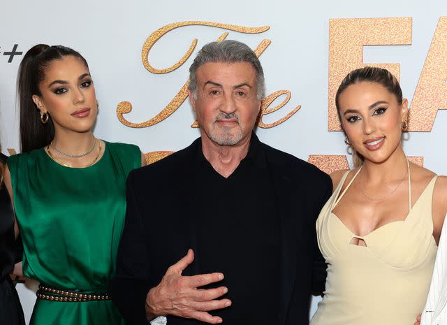 <p>Dimitrios Kambouris/Getty</p> Sylvester Stallone with daughters Sistine (left) and Sophia