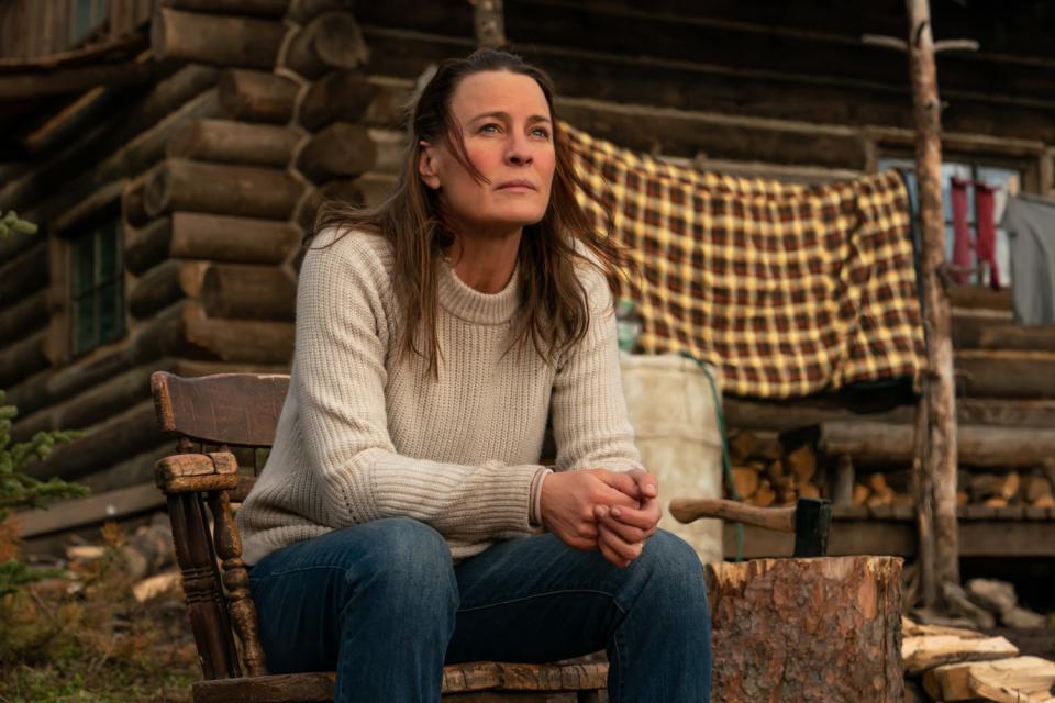 Robin Wright's Edee in a cream sweater.