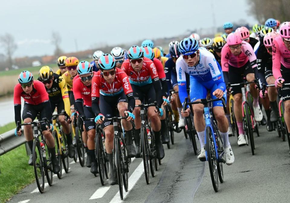 The Classic Brugge-De Panne peloton fight the wind and cold