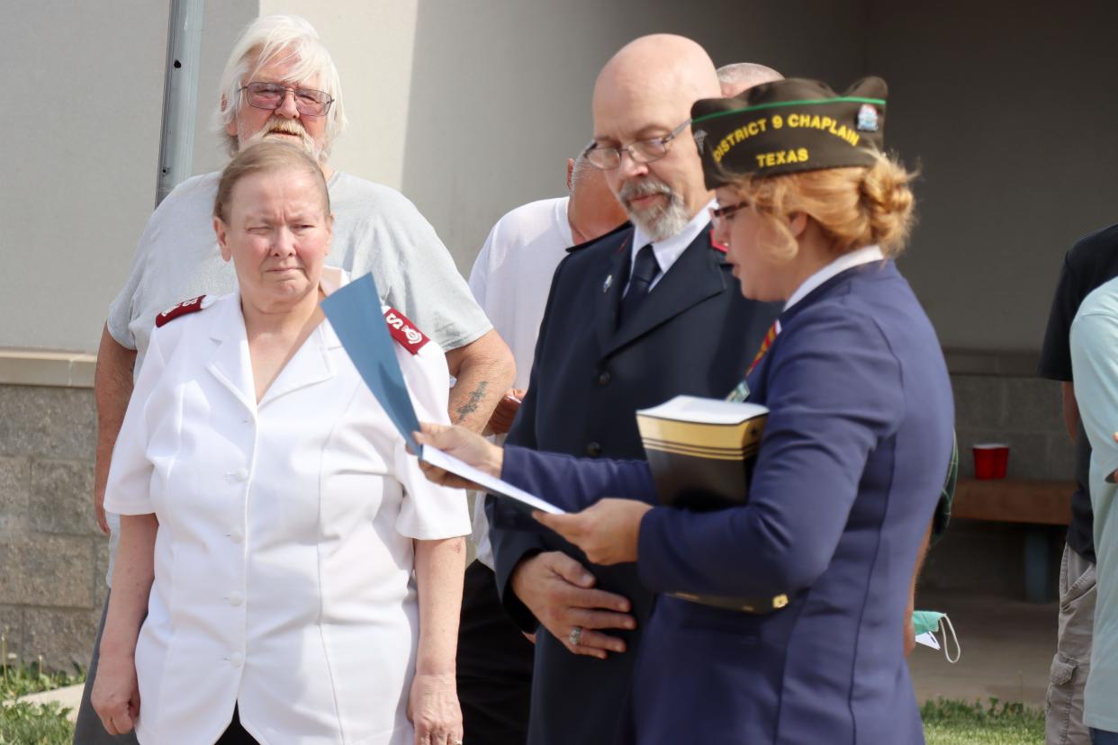 Brenna Barrett, right, District 9 Chaplin for VFW 1475, presents Majors Debra and Ernest Hull with a certificate of appreciation for two years of leadership with the Salvation Army Harrington Hope Center as they end their service in the Texas Panhandle.