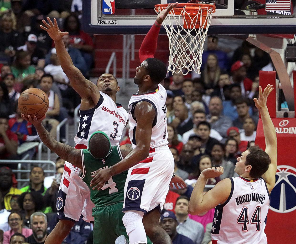 Bradley Beal, John Wall and the Wizards totally snuffed out Isaiah Thomas and the Celtics' offense in Game 3. (Barry Chin/The Boston Globe/Getty Images)
