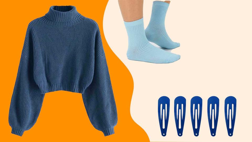 Transport yourself to the 'Simple Times' music video with the help of this oversized navy cropped sweater, matching hair barrettes, and baby blue socks.