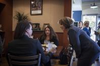 New Mexico Democratic gubernatorial candidate Michelle Lujan-Grisham speaks to constituents at Cocina Azul restaurant in Albuquerque, N.M., on midterms election day Tuesday, Nov. 6, 2018. (AP Photo/Juan Labreche)