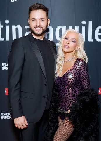 <p>Stefanie Keenan/Getty</p> Matthew Rutler and Christina Aguilera