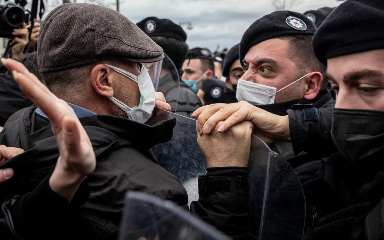 Police have been accused of beating up protesters - GETTY IMAGES