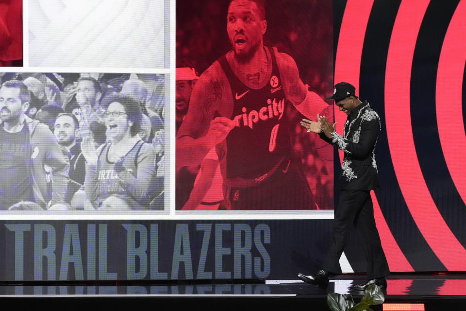 Scoot Henderson reacts after being selected third overall by the Portland Trail Blazers during the NBA basketball draf Thursday, June 22, 2023, in New York. (AP Photo/John Minchillo)