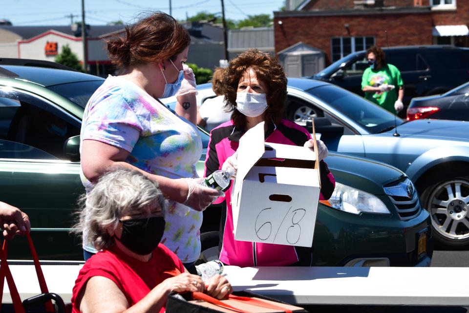 The Food Bank of Central New York hosted a food distribution for families in need on Friday, June 12, 2020, at St. John the Baptist Roman Catholic Church in Rome.