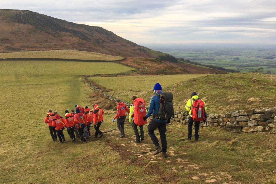 The Northern Echo: Paramedics carry the injured person down the hill