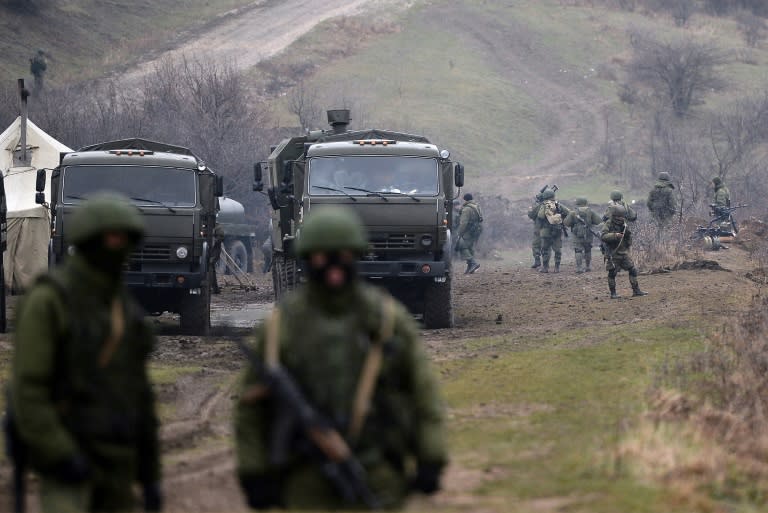 Russian soldiers 'patrolled' Crimea weeks before the Black Sea peninsula was annexed from Ukraine in March 2014