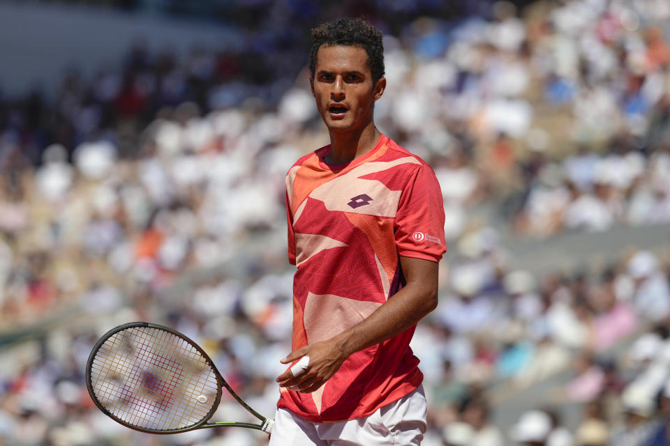 Peru's Juan Pablo Varillas reacts during his fourth round match of the French Open tennis tournament against Serbia's Novak Djokovic at the Roland Garros stadium in Paris, Sunday, June 4, 2023. (AP Photo/Thibault Camus)