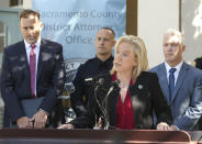 CORRECTS ARREST DAY OF WEEK TO THURSDAY, INSTEAD OF WEDNESDAY Sacramento County District Attorney Anne Marie Schubert, discusses the arrest of Roy Charles Waller, who is suspected of committing a series or rapes, during a news conference Friday, Sept. 21, 2018, in Sacramento, Calif. Waller, 58, was taken into custody in Berkeley by Sacramento Police, Thursday, Sept. 20, 2018, and faces multiple counts of rapes that occurred in Northern California starting in 1991. In the background are from left, is Brian Staebell, Sonoma County chief deputy district attorney, Sacramento Police Sgt. Vance Chandler and Jeff Reisig, Yolo County District Attorney, right, (AP Photo/Rich Pedroncelli)