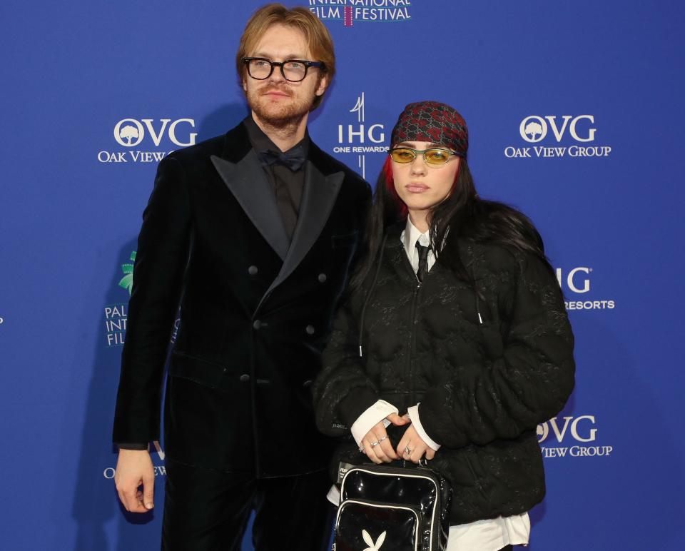 Billie Eilish, right, and Finneas are photographed on the red carpet during the Palm Springs International Film Festival Film Awards Presentation at the Palm Springs Convention Center in Palm Springs, Calif., on Thurs., Jan. 4, 2024.