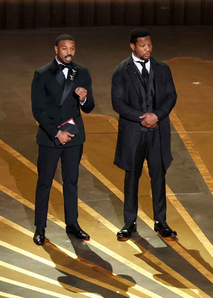 Michael B. Jordan and Jonathan Majors onstagee at the 95th Annual Academy Awards