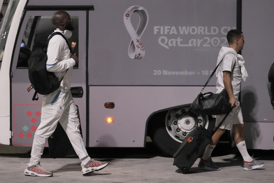 Eden Hazard, right, and Romelu Lukaku of Belgium's national soccer team arrive with teammates at Hamad International airport in Doha, Qatar, Saturday, Nov. 19, 2022 ahead of the upcoming World Cup. Belgium will play the first match in the World Cup against Canada on Nov. 23. (AP Photo/Hassan Ammar)