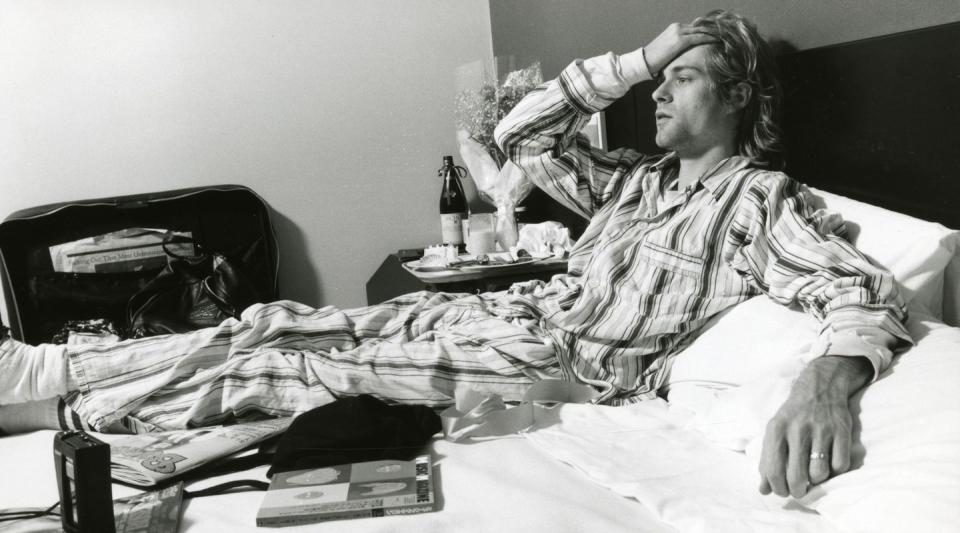 <p>Kurt Cobain of Nirvana, lying in bed wearing pajamas in Roppongi Prince Hotel in Tokyo, Japan, during an interview, 19th December 1992.</p>