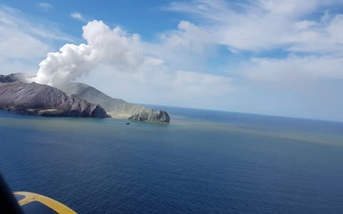 A view of White Island, New Zealand from a helicopter, after a volcanic eruption December 9, 2019, in this picture obtained from social media - Credit: Reuters