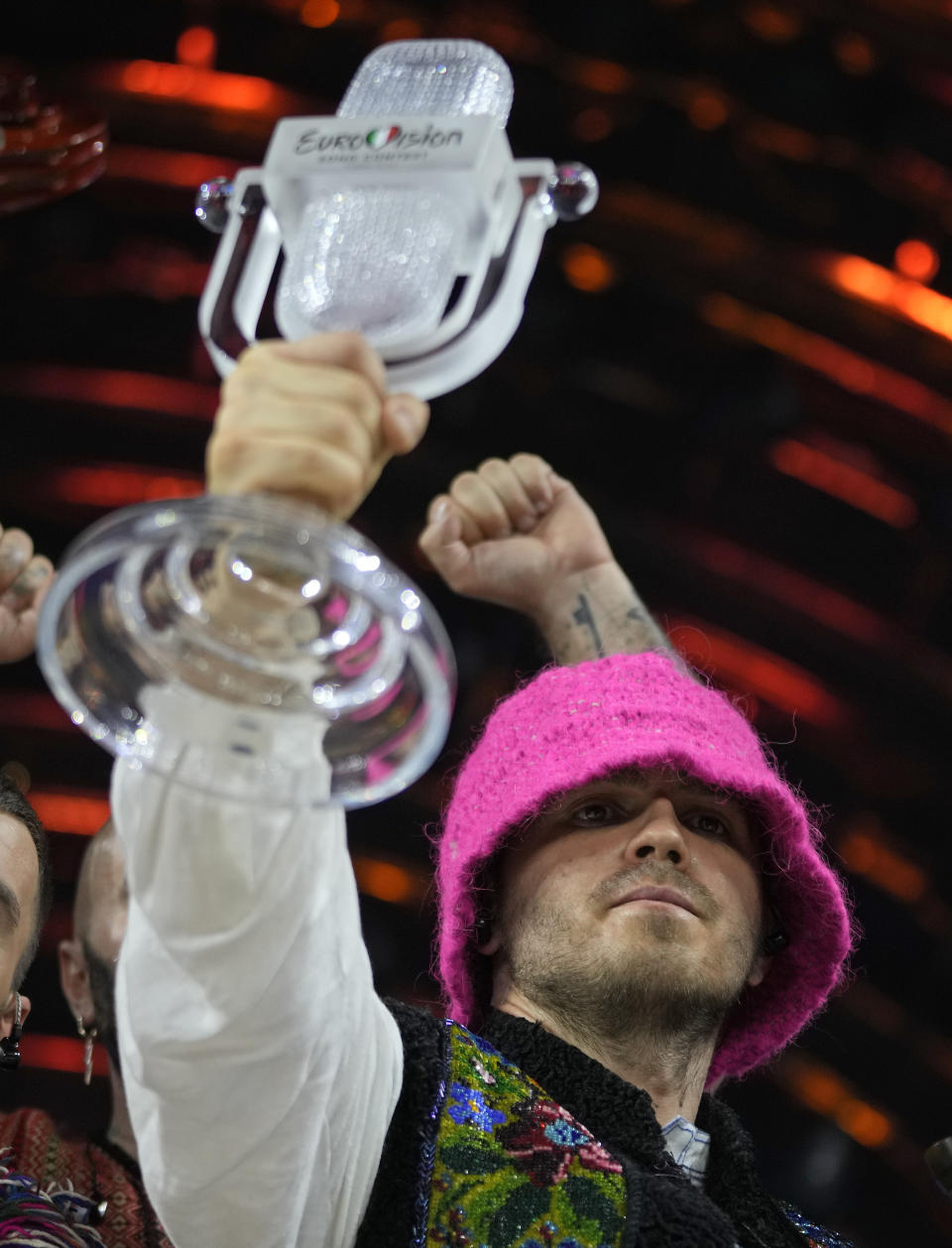 Members of the Kalush Orchestra from Ukraine celebrate after winning the Grand Final of the Eurovision Song Contest at Palaolimpico arena, in Turin, Italy, Saturday, May 14, 2022. (AP Photo/Luca Bruno)