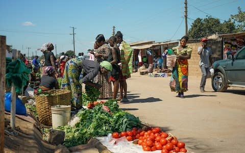 Food for sale along the streets of Mutendere Compound, Chelstone sub-district. Street vending was banned after the cholera outbreak but people are still selling in order to make a living. Lusaka, Zambia, May 2018. - Credit: Chileshe Chanda/WaterAid