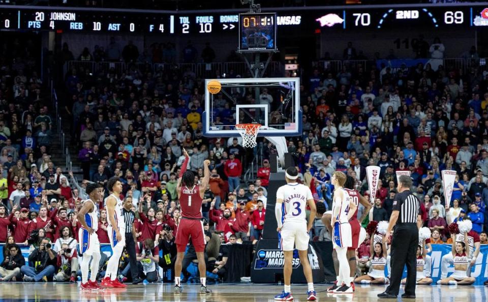 Arkansas guard Ricky Council IV (1) shoots a free throw against Kansas during a second-round college basketball game in the NCAA Tournament Saturday, March 18, 2023, in Des Moines, Iowa.