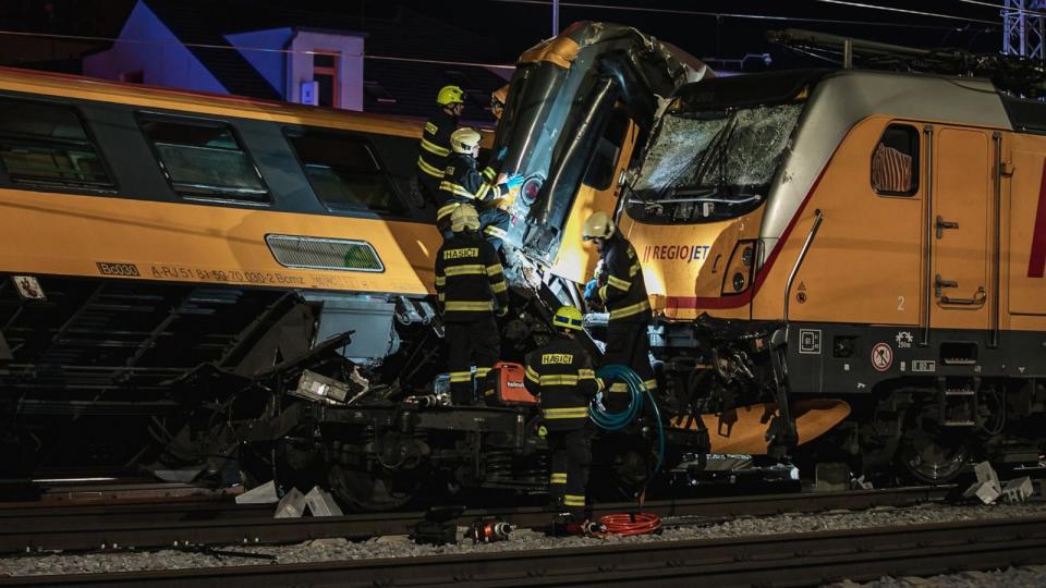 PHOTO: Firefighters work in the aftermath of a train crash in the city of Pardubice, Czech Republic, on June 5, 2024.  (Jiri Sejkora/EPA via Shutterstock)