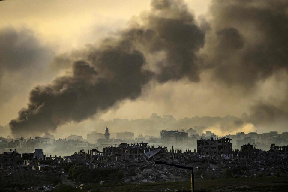 The view from the Israeli side of the border with the Gaza Strip on Thursday, showing the impact of Israeli strikes (AFP via Getty Images)