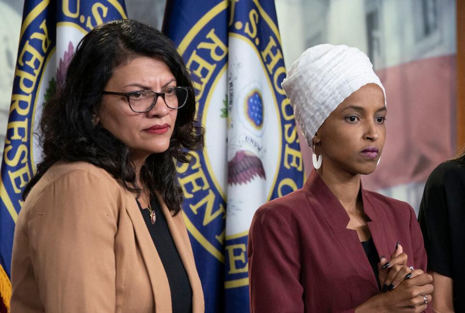 Democratic Reps. Rashida Tlaib of Michigan (left) and Ilhan Omar of Minnesota (right) were banned from visiting Israel, the country's prime minister announced Thursday. (Photo: ASSOCIATED PRESS)