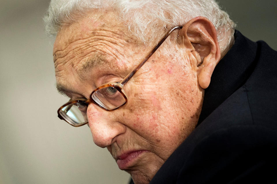 Former US Secretary of State Henry Kissinger listens while he is introduced at a ceremony honoring his diplomatic career on May 9, 2016 at the Pentagon in Washington, DC. (Photo by Brendan Smialowski / AFP) (Photo by BRENDAN SMIALOWSKI/AFP via Getty Images)