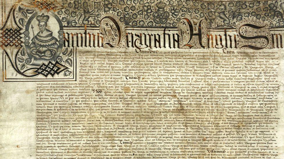A town charter for Huntingdon issued by Charles I in 1631, with an ornate top inscription at the top