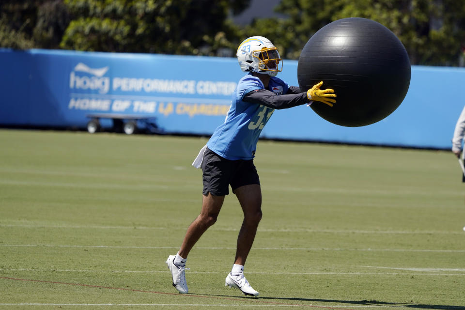 Los Angeles Chargers defensive back Deane Leonard (33) goes through a drill during an NFL football rookie minicamp, Friday, May 13, 2022, in Costa Mesa, Calif. (AP Photo/Marcio Jose Sanchez)