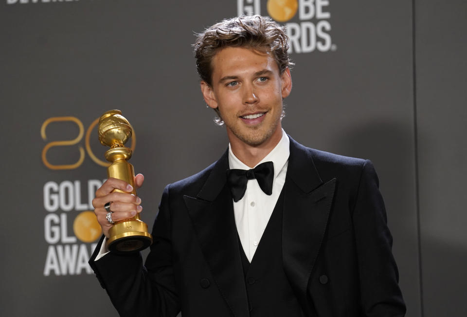 Austin Butler poses in the press room with the award for best performance by an actor in a motion picture, drama for "Elvis" at the 80th annual Golden Globe Awards at the Beverly Hilton Hotel on Tuesday, Jan. 10, 2023, in Beverly Hills, Calif. (Photo by Chris Pizzello/Invision/AP)