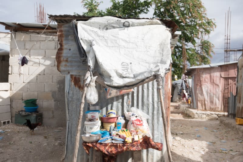 Goods set for sale are seen in a street stand in Caradeux, a camp for people displaced by the January 2010 earthquake, in Port-au-Prince