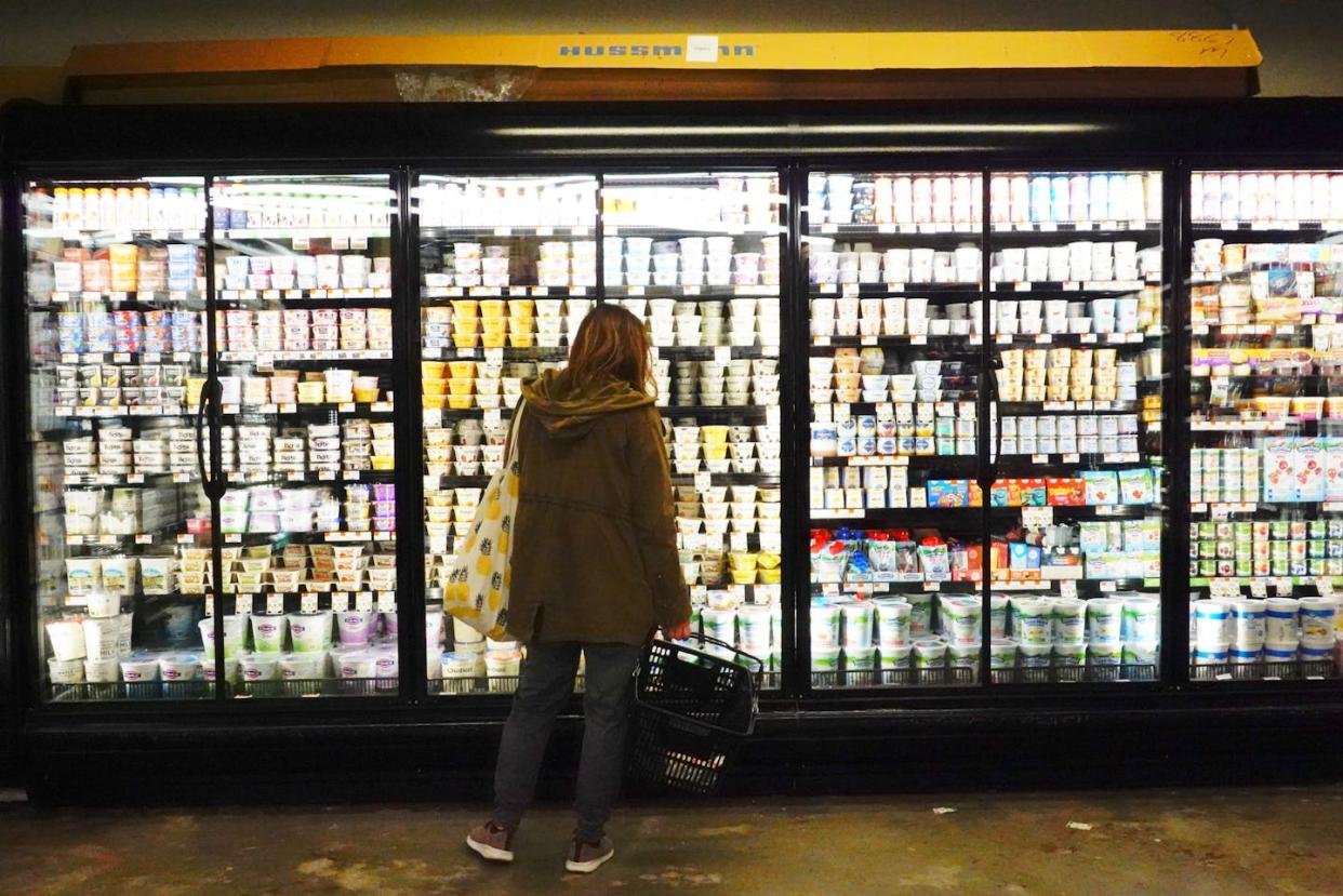 Headline inflation is cooling, too. <a href="https://www.gettyimages.com/detail/news-photo/person-shops-for-groceries-at-lincoln-market-on-march-10-news-photo/1383939743" rel="nofollow noopener" target="_blank" data-ylk="slk:Michael M. Santiago/Getty Images;elm:context_link;itc:0;sec:content-canvas" class="link ">Michael M. Santiago/Getty Images</a>